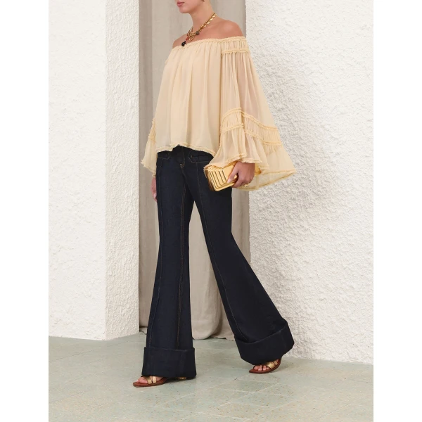 Elevate your elegance in this Zimmermann Tops   from the 2025 resort wear edit