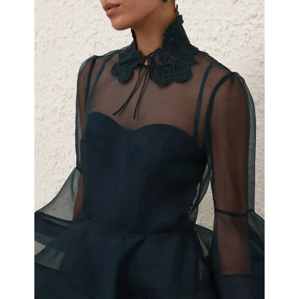Elevate your elegance in this Zimmermann Tops   from the 2025 resort wear edit