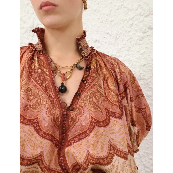 Elevate your elegance in this Zimmermann Tops   from the 2025 resort wear edit