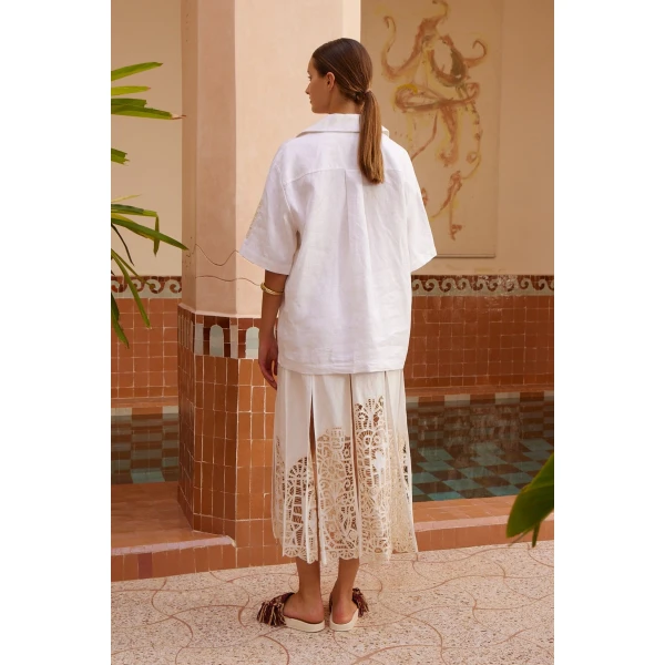 Elevate your elegance in this Alemais Tops from the resort wear edit