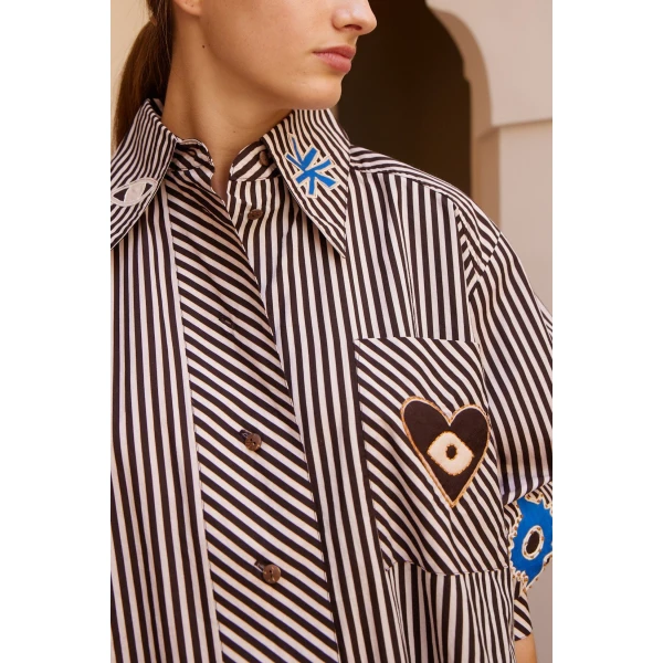 Elevate your elegance in this Alemais Tops from the resort wear edit