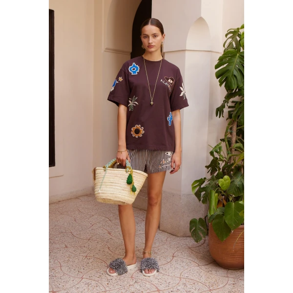 Elevate your elegance in this Alemais Tops from the resort wear edit