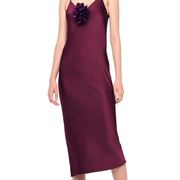 Elevate your elegance in this Norma Kamali  from the resort wear edit