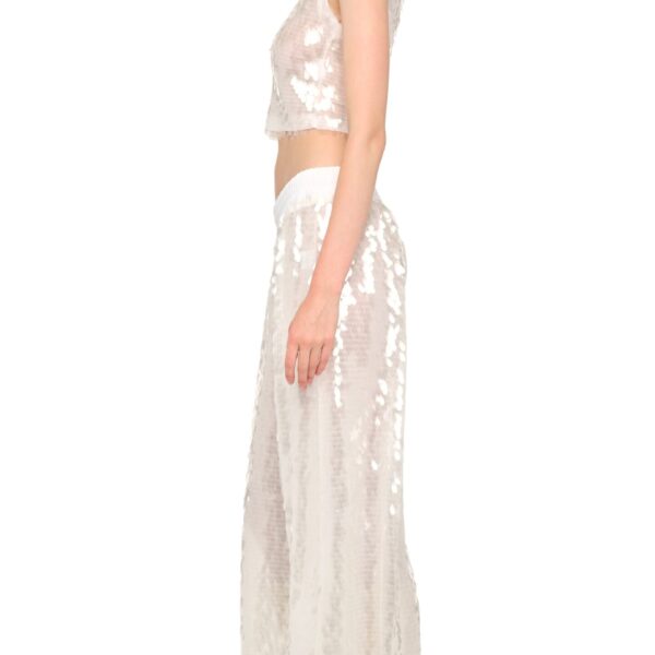 Elevate your elegance in this Norma Kamali  from the resort wear edit