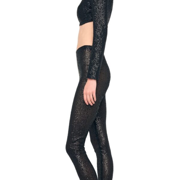Elevate your elegance in this Norma Kamali  from the resort wear edit