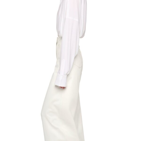 Elevate your elegance in this Norma Kamali  from the resort wear edit
