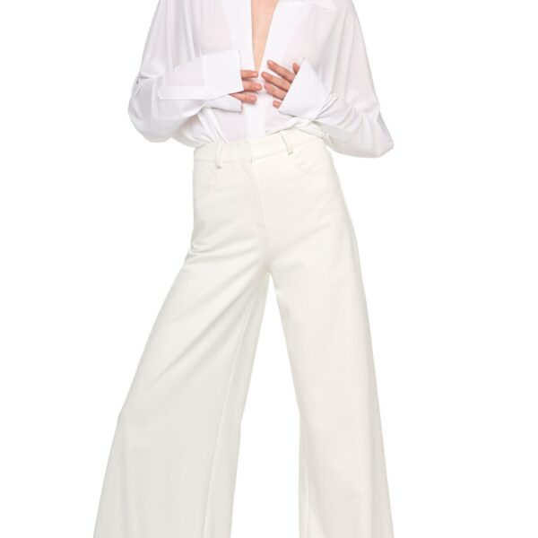 Elevate your elegance in this Norma Kamali  from the resort wear edit