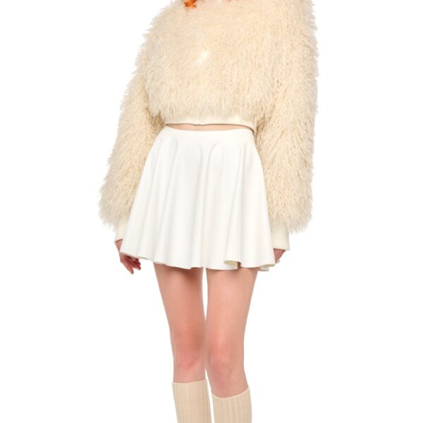 Elevate your elegance in this Norma Kamali  from the resort wear edit