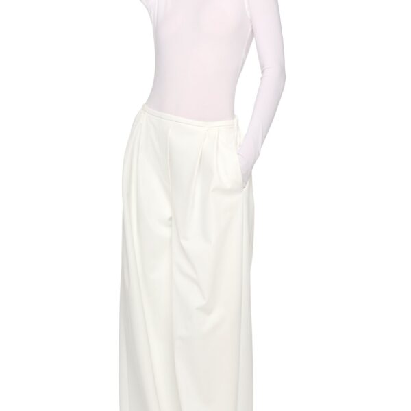 Elevate your elegance in this Norma Kamali  from the resort wear edit