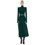 Elevate your elegance in this Norma Kamali  from the resort wear edit