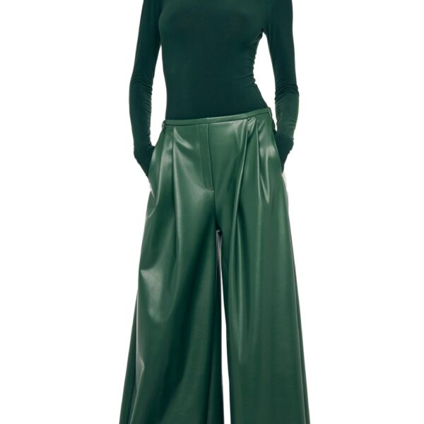 Elevate your elegance in this Norma Kamali  from the resort wear edit