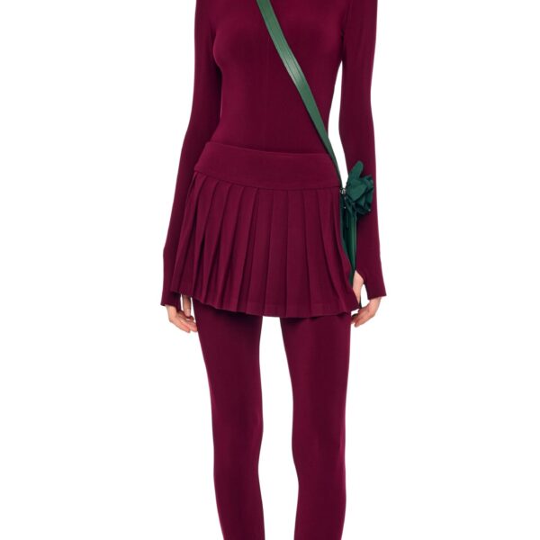 Elevate your elegance in this Norma Kamali  from the resort wear edit