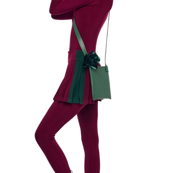 Elevate your elegance in this Norma Kamali  from the resort wear edit