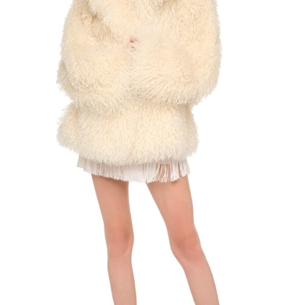 Elevate your elegance in this Norma Kamali  from the resort wear edit