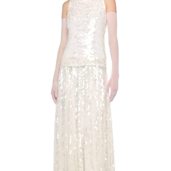 Elevate your elegance in this Norma Kamali  from the resort wear edit