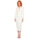 Elevate your elegance in this Norma Kamali  from the resort wear edit