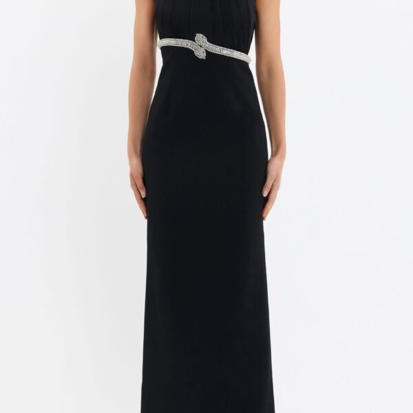 featuring diamante-embellished snake motifs for a touch of opulence. Its halter neckline and asymmetrical pleated bodice sculpt a sophisticated shape