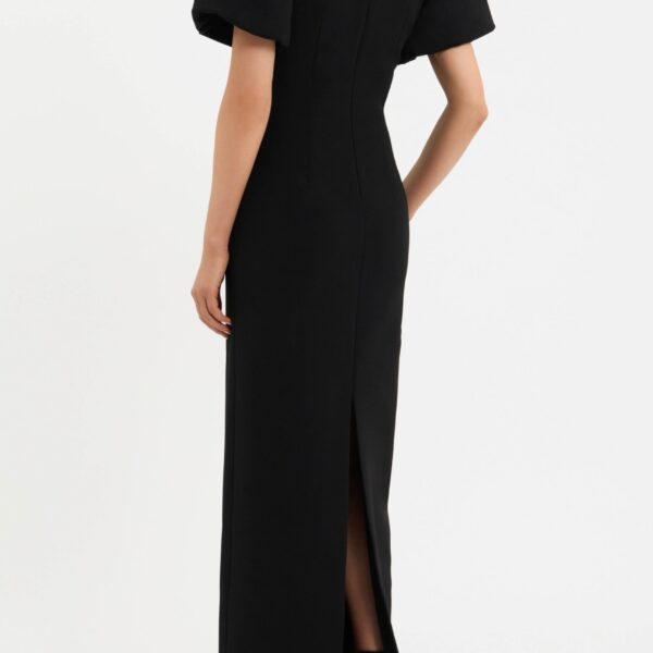 cinched at the waist to flatter the figure. The column maxi skirt offers an elegant silhouette