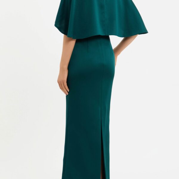 enhanced by a back split for ease of wear. Lined and secured with a zip fastening at the back