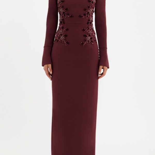 tailored from bonded crepe. Featuring intricate floral beaded applique