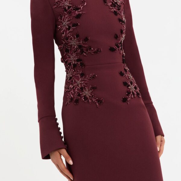 and fitted bodice shape an elegant figure