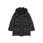 Woman wearing Yves Salomon shearling fur coat – luxury outerwear at Coveti