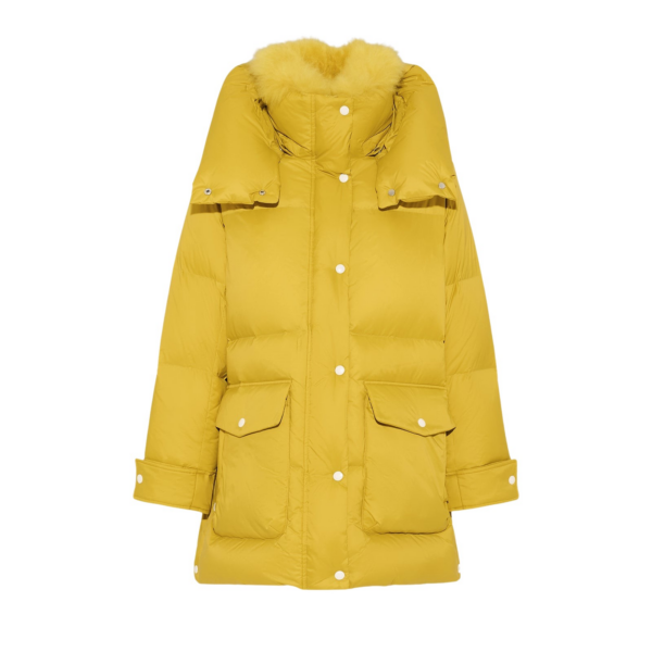 Woman wearing Yves Salomon shearling fur coat – luxury outerwear at Coveti