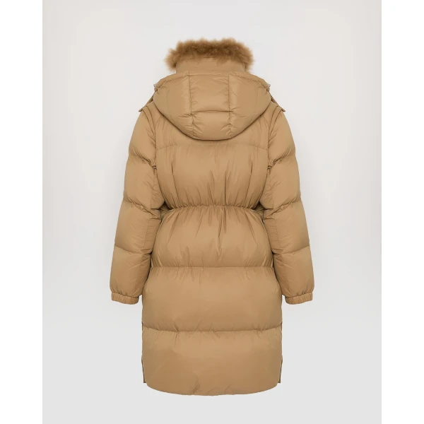 Woman wearing Yves Salomon shearling fur coat – luxury outerwear at Coveti