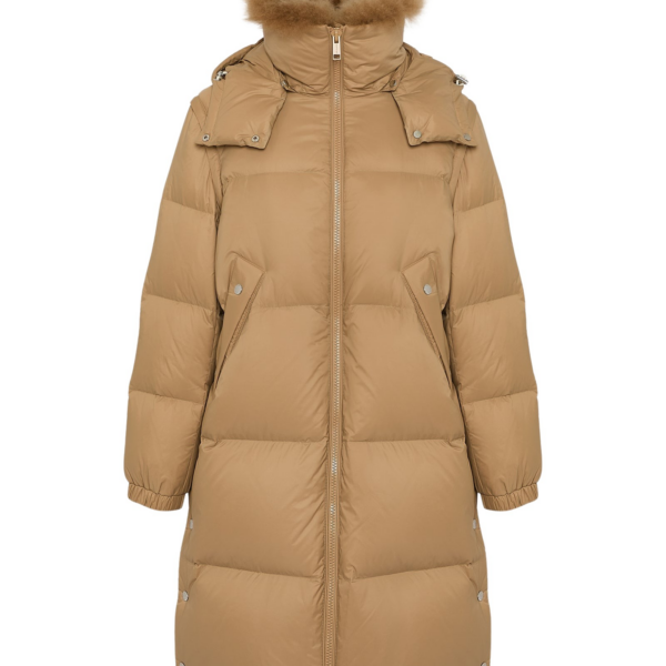 Woman wearing Yves Salomon shearling fur coat – luxury outerwear at Coveti