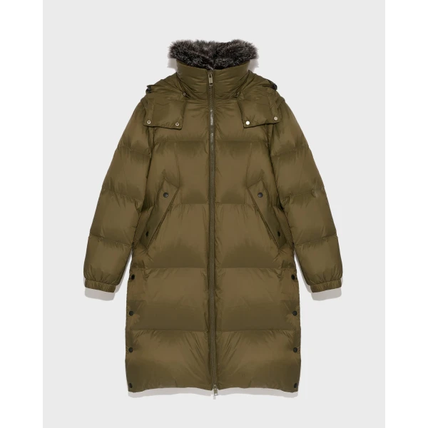 Woman wearing Yves Salomon shearling fur coat – luxury outerwear at Coveti