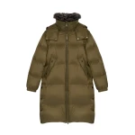 Woman wearing Yves Salomon shearling fur coat – luxury outerwear at Coveti