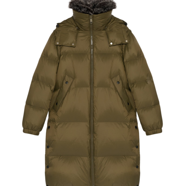 Woman wearing Yves Salomon shearling fur coat – luxury outerwear at Coveti