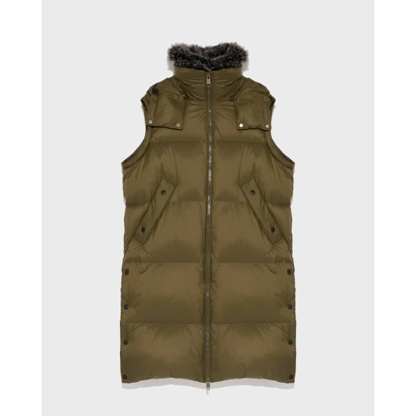 Woman wearing Yves Salomon shearling fur coat – luxury outerwear at Coveti