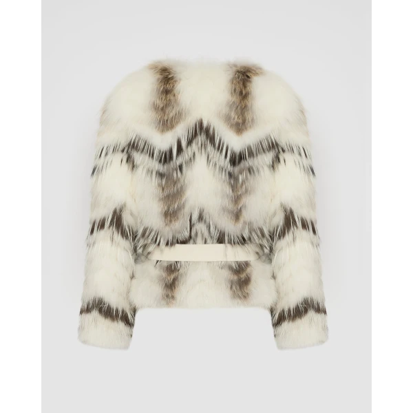 Woman wearing Yves Salomon shearling fur coat – luxury outerwear at Coveti