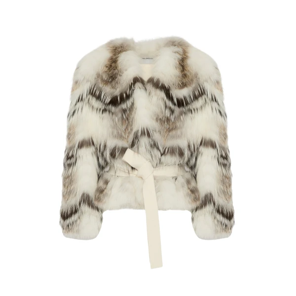 Woman wearing Yves Salomon shearling fur coat – luxury outerwear at Coveti