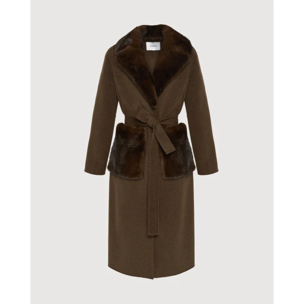 Woman wearing Yves Salomon shearling fur coat – luxury outerwear at Coveti