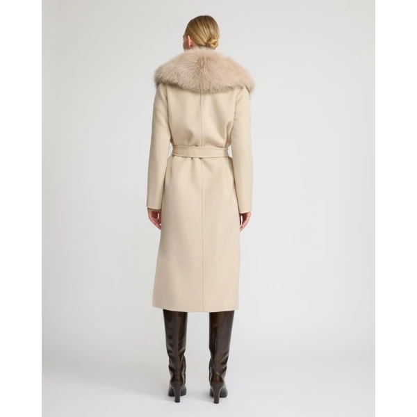 Woman wearing Yves Salomon shearling fur coat – luxury outerwear at Coveti