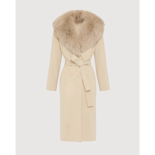 Woman wearing Yves Salomon shearling fur coat – luxury outerwear at Coveti