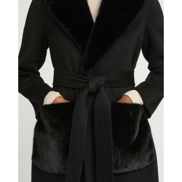 Woman wearing Yves Salomon shearling fur coat – luxury outerwear at Coveti