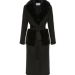 Woman wearing Yves Salomon shearling fur coat – luxury outerwear at Coveti