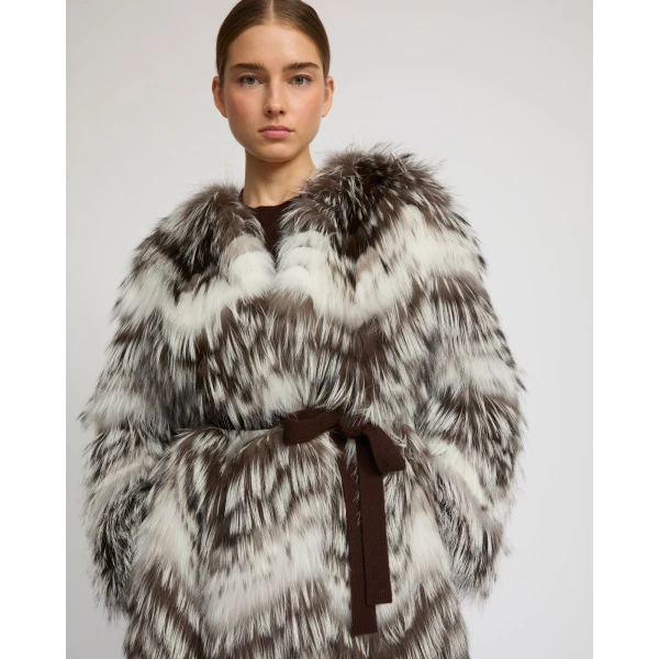 Woman wearing Yves Salomon shearling fur coat – luxury outerwear at Coveti