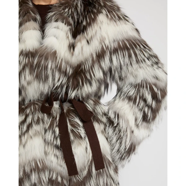 Woman wearing Yves Salomon shearling fur coat – luxury outerwear at Coveti