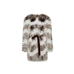 Woman wearing Yves Salomon shearling fur coat – luxury outerwear at Coveti