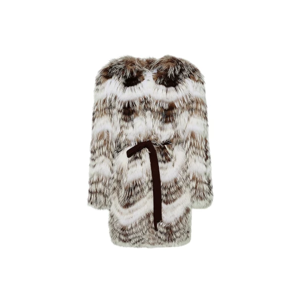 Woman wearing Yves Salomon shearling fur coat – luxury outerwear at Coveti