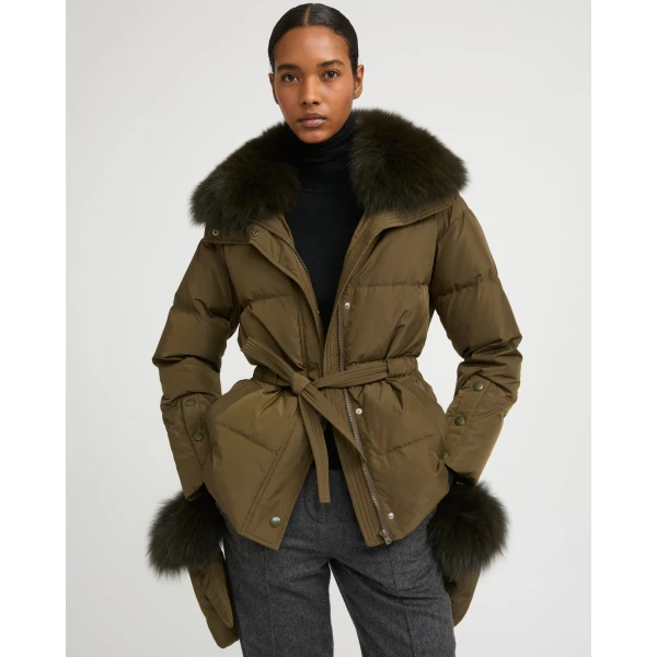 Woman wearing Yves Salomon shearling fur coat – luxury outerwear at Coveti