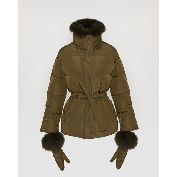 Woman wearing Yves Salomon shearling fur coat – luxury outerwear at Coveti