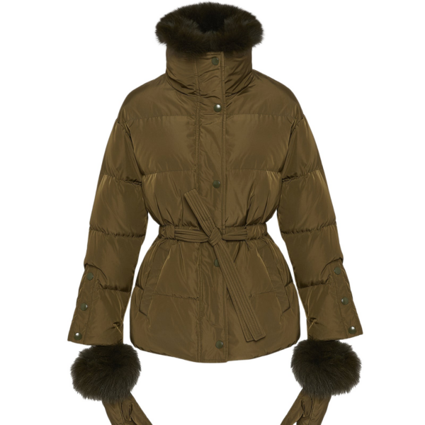 Woman wearing Yves Salomon shearling fur coat – luxury outerwear at Coveti