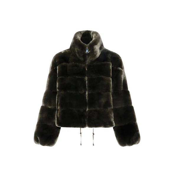 Woman wearing Yves Salomon shearling fur coat – luxury outerwear at Coveti