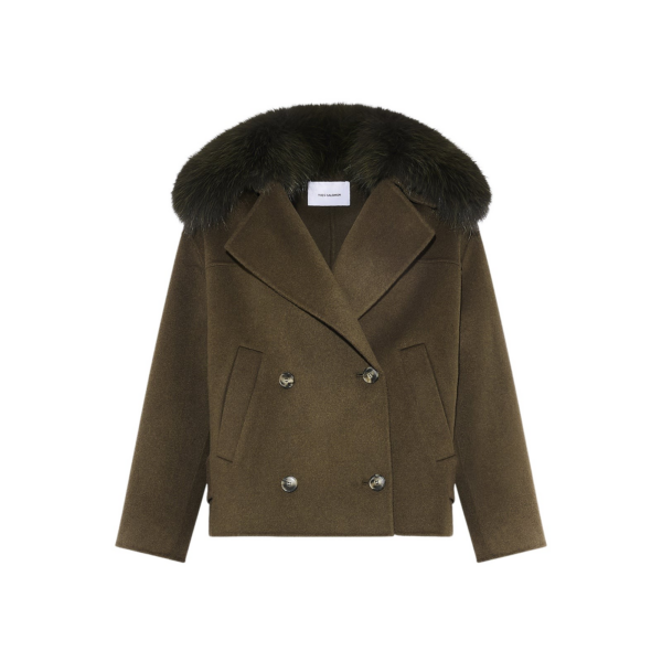 Woman wearing Yves Salomon shearling fur coat – luxury outerwear at Coveti