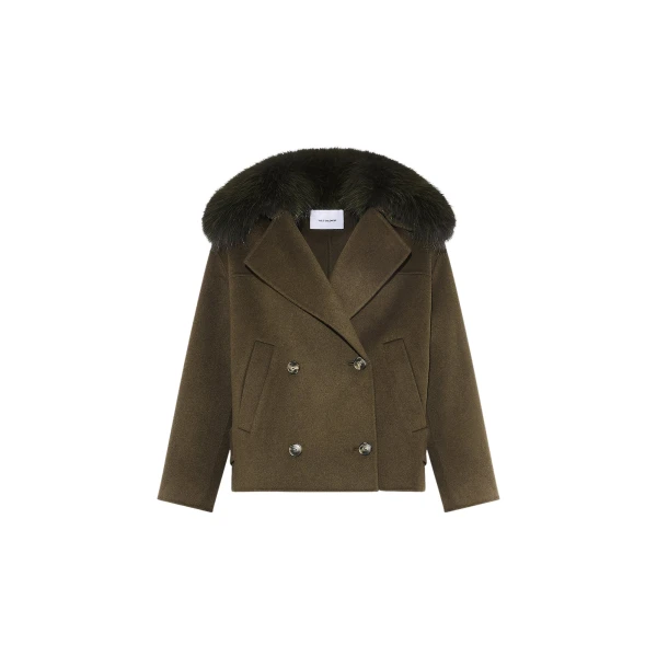 Woman wearing Yves Salomon shearling fur coat – luxury outerwear at Coveti